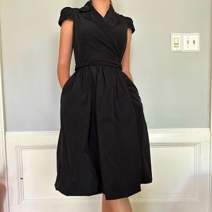 A stunning Calvin Klein black dress that looks like something from the 50s.